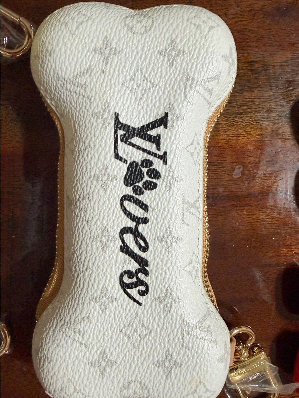 Louis Vuitton White and Gold Bone-Shaped Treat Pouch